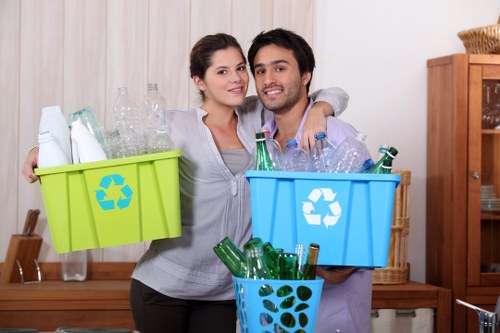 Loft clearance team organizing items in Plumstead